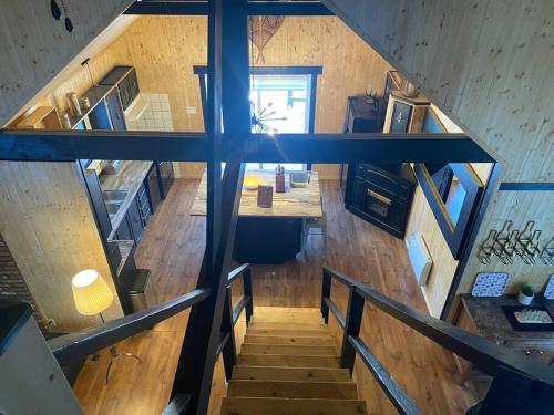 a view of a staircase in a house at LE JAZZ- Chalet rustique/chic avec SPA in Notre-Dame-Des-Bois