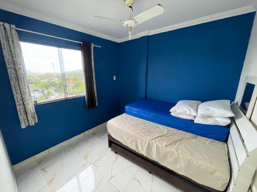 Postel nebo postele na pokoji v ubytování Apartamento 51 proximo a praia da Enseada