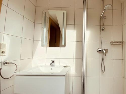 Koupelna v ubytování Aramis Studio Hotel