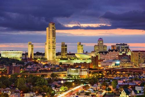 a view of a city at night at Luxury Style 2 King Bed WD FREE Garage in Schenectady