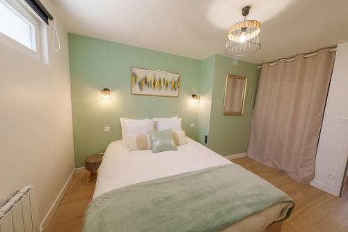 Katil atau katil-katil dalam bilik di L'Escale Tropicale, appartement indépendant avec terrasse privative