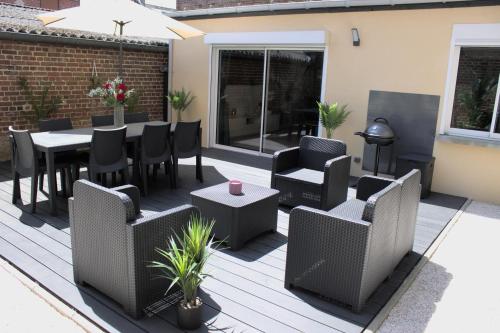 Ruang duduk di L'Escale Tropicale, appartement indépendant avec terrasse privative