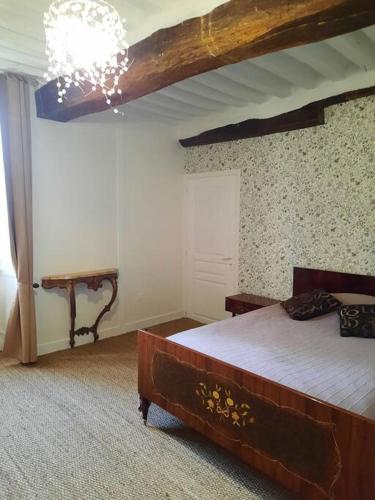 Katil atau katil-katil dalam bilik di Gîte du Manoir