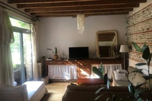 TV a/nebo společenská místnost v ubytování Chambre privée Toulouse proche métro et rocade