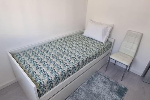 Ένα ή περισσότερα κρεβάτια σε δωμάτιο στο Apartamento Palomar