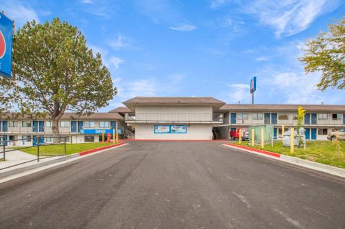 an empty road in front of a building at Motel 6-Elko, NV in Elko