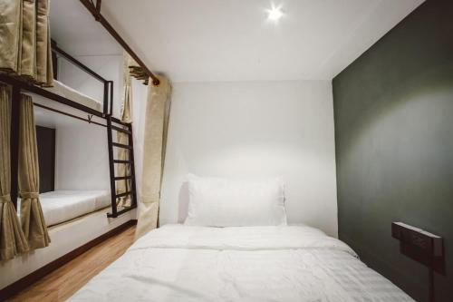 Postel nebo postele na pokoji v ubytování DANG HOSTEL