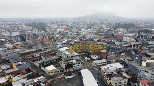 an aerial view of a city with buildings at Hotel Ebenezer in Santo Domingo de los Colorados