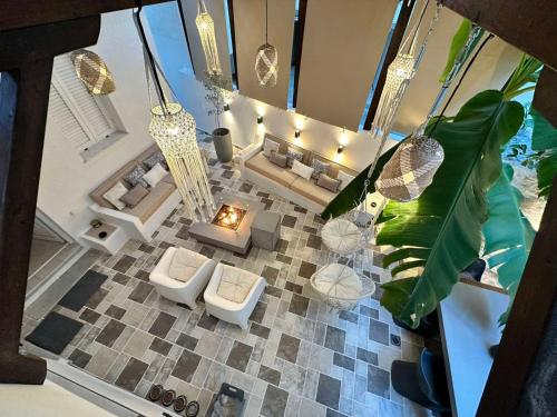 an aerial view of a living room with a fireplace at Casa Magnolia Patras in Patra