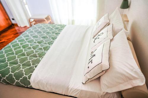 Ένα ή περισσότερα κρεβάτια σε δωμάτιο στο Vagabondo Apartment
