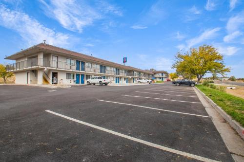 an empty parking lot in front of a building at Motel 6-Elko, NV in Elko