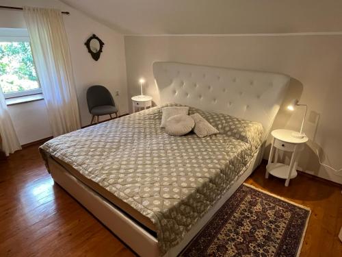 Säng eller sängar i ett rum på Vila Stančič