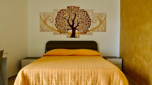Ένα ή περισσότερα κρεβάτια σε δωμάτιο στο B&b Niu Susu