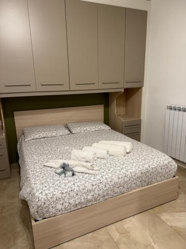 מיטה או מיטות בחדר ב-VIA DIAZ - Nel Centro di Lioni