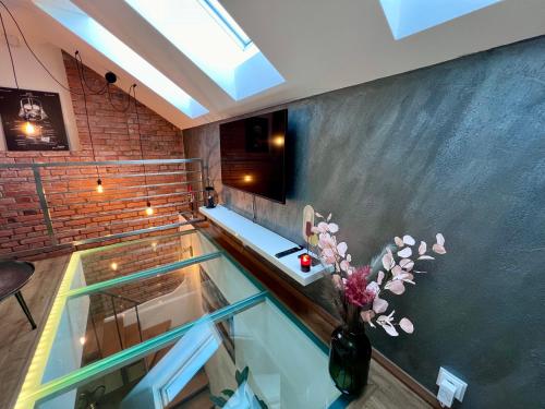 Μια τηλεόραση ή/και κέντρο ψυχαγωγίας στο Loftový apartmán Laura