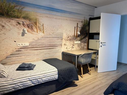 En eller flere senge i et værelse på Blue Cottage Bruxelles Sud