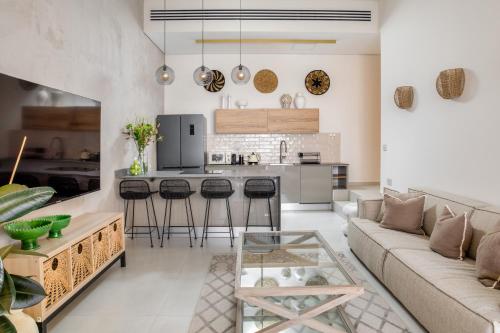 a living room with a couch and a table at Diamond in the Desert- for families in Eilat