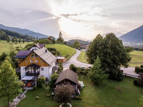 an aerial view of a house on a hill with a road at Landlust Ischl in Bad Ischl