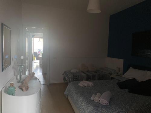 Ένα ή περισσότερα κρεβάτια σε δωμάτιο στο Casa Galatea