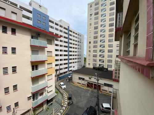 a view of a street in a city with buildings at Apto Santos Gonzaga in Santos