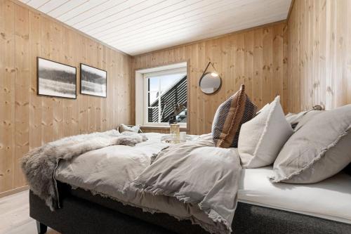 Postel nebo postele na pokoji v ubytování Leilighet i Sogndal skisenter - Hodlekve