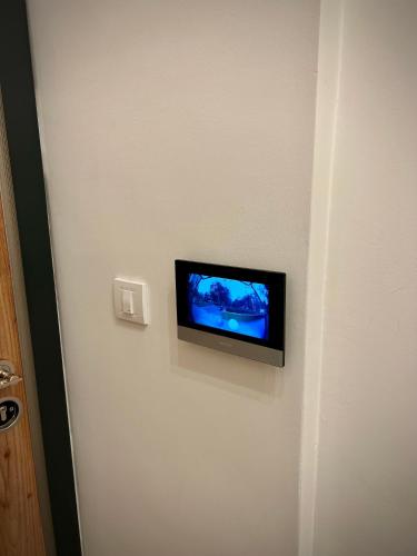 AJ Luxe Residenceにあるテレビまたはエンターテインメントセンター