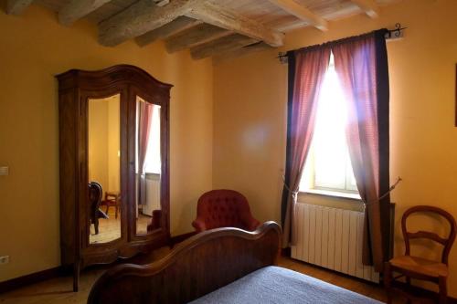 Postel nebo postele na pokoji v ubytování Gîte d'En Lébé