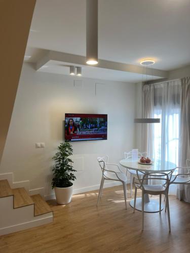 A television and/or entertainment centre at Casa Torre Hacho