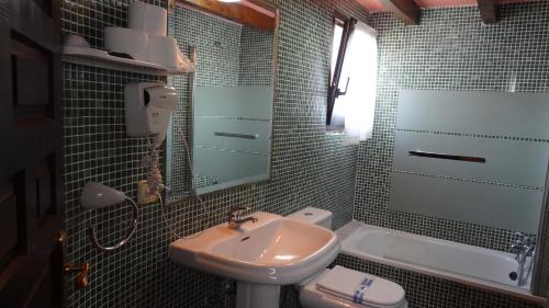 Kylpyhuone majoituspaikassa Hotel Intriago I & II