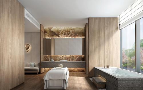 Postel nebo postele na pokoji v ubytování Sheraton Ninghai