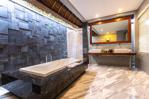 Koupelna v ubytování Abi Bali Resort and Villa