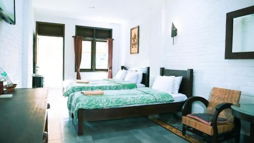 Katil atau katil-katil dalam bilik di The Satu Stay Kayen