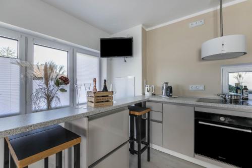 Η κουζίνα ή μικρή κουζίνα στο Wohnung Deluxe