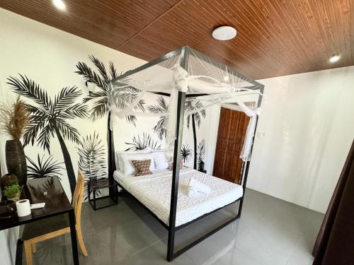 Postel nebo postele na pokoji v ubytování Mahajab Homestay SIARGAO