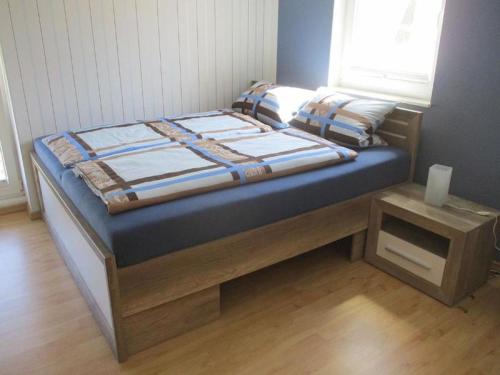 Ένα ή περισσότερα κρεβάτια σε δωμάτιο στο Fewo 1 - Osterberg