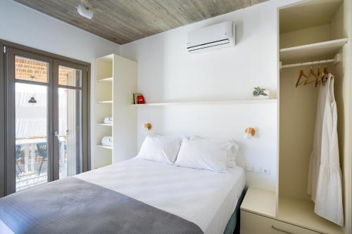 Cama o camas de una habitación en Flaros Village