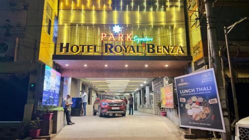 a hotel royal hawaiian sign in a building at PARK SIGNATURE HOTELS - Royal Benza in Vijayawāda