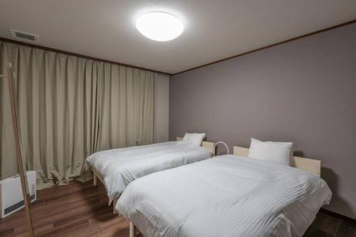 صورة لـ ペットと泊まれる一日一組限定の貸切ヴィラ　ウェルシー山中湖 في ياماناكاكو