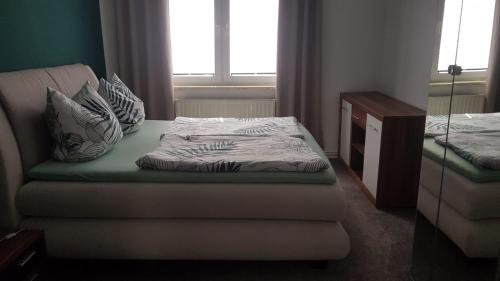 Posteľ alebo postele v izbe v ubytovaní Ferienwohnung Geiseltalsee