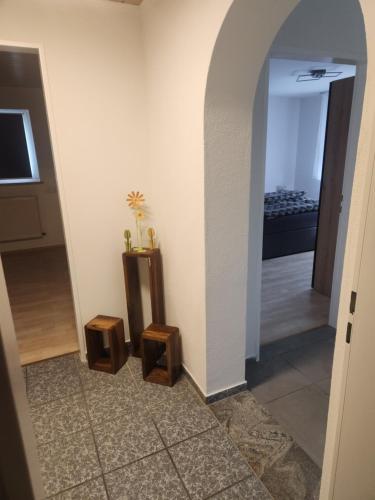 a room with a hallway with aoyer with a stairway at Apartment am Südhang 2 in Dinkelsbühl