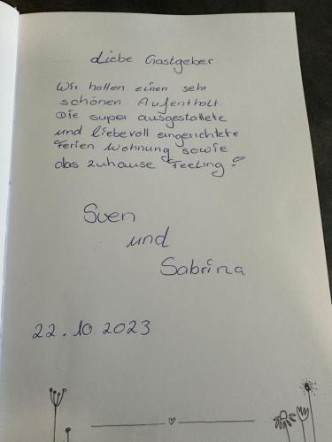 a piece of white paper with writing on it at Ferienwohnung Appartamento Da Vinci in Eisenach