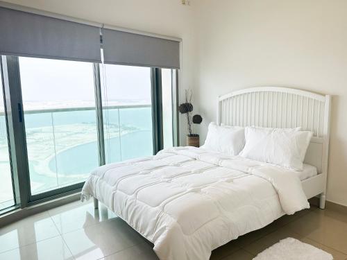 Postel nebo postele na pokoji v ubytování Beachfront Haven Bliss 2801A