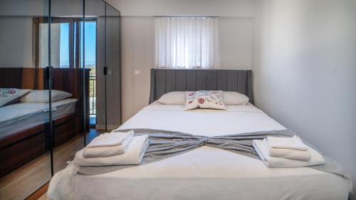 Säng eller sängar i ett rum på Nature View Flat with Balcony 7 min to Bargylia
