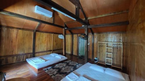 Giường trong phòng chung tại Your home Mai Chau
