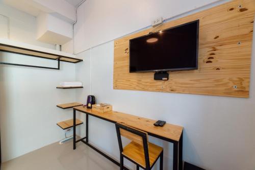 Televisyen dan/atau pusat hiburan di Joox A - Serviced Apartment