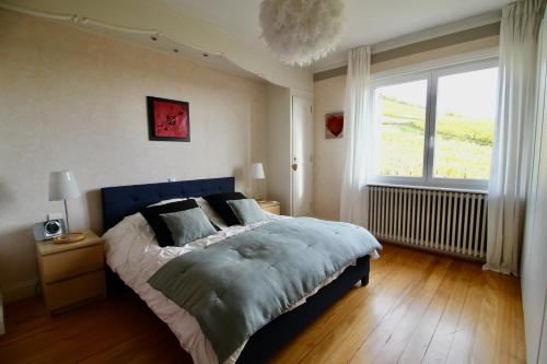 Una cama o camas en una habitación de Escapade au Bube - Vue exceptionnelle - Nouveau