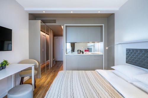 Letto o letti in una camera di Alliance Palace Batumi
