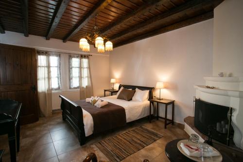 Ένα ή περισσότερα κρεβάτια σε δωμάτιο στο Enastron Guesthouse