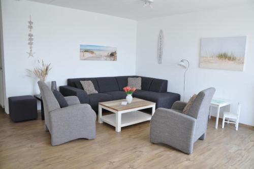Posezení v ubytování Duinerei Penthouse B302