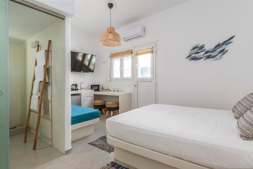 Postel nebo postele na pokoji v ubytování Kleris Studio 1 Tinos